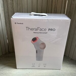 Therabody TheraFace PRO in White and Pink